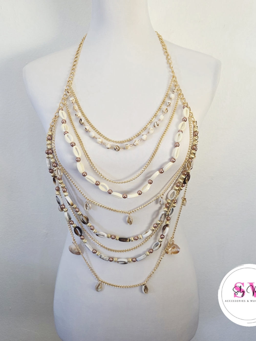 Multistrand gold and cream shell body chain